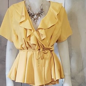 Bright sunshine yellow wraparound blouse with ruff